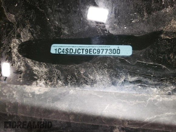2014 Dodge Durango R/T with VIN 1C4SDJCT9EC977300, listed as a Copart auction lot 49930435 with 165,569 mi miles and Salvage title. Bid and sale history available at DreamBid. Image 15.