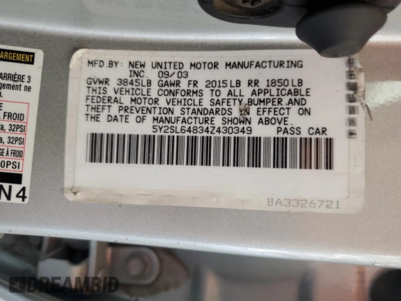 2004 Pontiac Vibe with VIN 5Y2SL64834Z430349, listed as a Copart auction lot 63217785 with 186,576 mi miles and Salvage title. Bid and sale history available at DreamBid. Image 13.