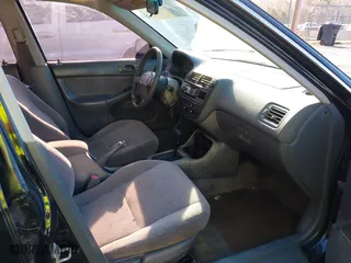 1997 Honda Civic EX with VIN 2HGEJ8645VH566736, listed as a IAAI auction lot 41876647 with 277,968 mi miles. Bid and sale history available at carsss.com. Image 5.
