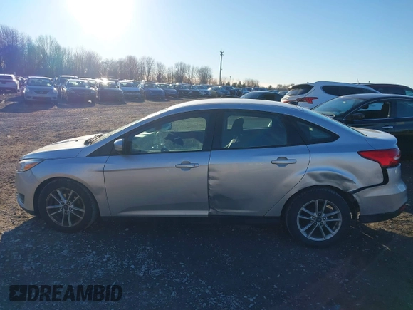 2017 Ford Focus SE with VIN 1FADP3F27HL321914, listed as a IAAI auction lot 40821776 with 87,689 mi miles and . Bid and sale history available at DreamBid. Image 15.