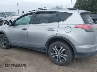 2016 Toyota RAV4 LE with VIN 2T3ZFREV4GW306588, listed as a IAAI auction lot 41686915 with 188,615 mi miles and . Bid and sale history available at DreamBid. Image 14.