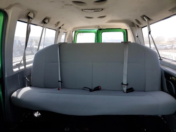 2012 Ford Econoline Passenger XL with VIN 1FBSS3BL0CDB35654, listed as a Copart auction lot 63065805 with 189,702 mi miles and Salvage title. Bid and sale history available at DreamBid. Image 10.