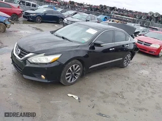 2016 Nissan Altima 2.5 SL with VIN 1N4AL3AP4GC161524, listed as a IAAI auction lot 41317383 with 144,810 mi miles. Bid and sale history available at carsss.com. Image 17.