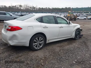 2012 Infiniti M37 with VIN JN1BY1AR6CM392969, listed as a IAAI auction lot 42021761 with 213,718 mi miles. Bid and sale history available at carsss.com. Image 4.