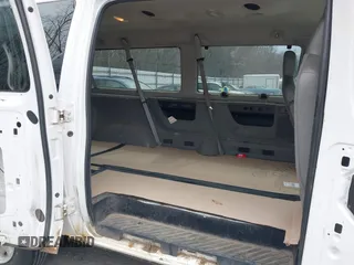 2009 Ford Econoline Passenger XL with VIN 1FBSS31L79DA65158, listed as a IAAI auction lot 41953876 with 181,240 mi miles. Bid and sale history available at carsss.com. Image 8.