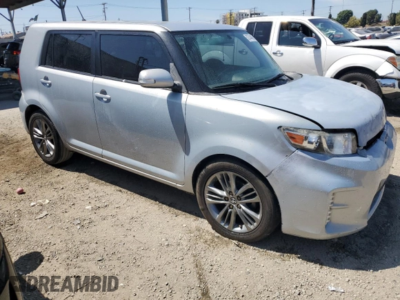 2013 Scion xB with VIN JTLZE4FE5DJ039321, listed as a Copart auction lot 52744485 with 128,536 mi miles and Salvage Title. Bid and sale history available at carsss.com. Image 4.