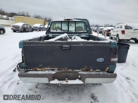 1997 Ford Ranger XLT with VIN 1FTCR10AXVUD48518, listed as a Copart auction lot 41518815 with 400,246 mi miles and Salvage title. Bid and sale history available at DreamBid. Image 6.