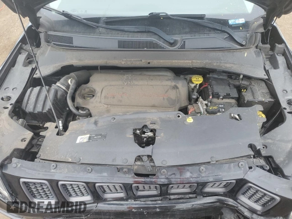 2018 Jeep Compass Trailhawk with VIN 3C4NJDDB6JT207289, listed as a Copart auction lot 56013675 with 83,385 mi miles and Salvage title. Bid and sale history available at DreamBid. Image 12.