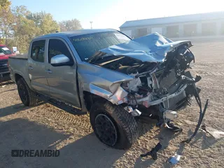2022 Toyota Tacoma SR with VIN 3TMCZ5AN4NM494409, listed as a IAAI auction lot 40611489 with 34,045 mi miles and . Bid and sale history available at DreamBid. Image 1.