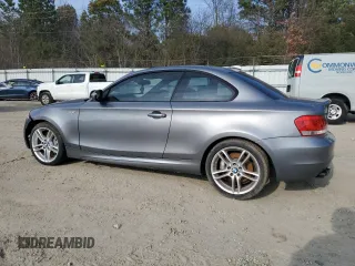 2012 BMW 1 Series 135i with VIN WBAUC9C56CVM12237, listed as a Copart auction lot 85595234 with Not provided miles and Salvage title. Bid and sale history available at DreamBid. Image 2.