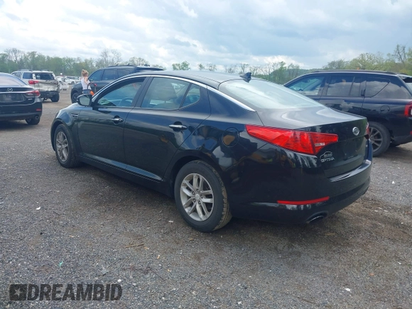 2012 Kia Optima LX with VIN KNAGM4A73C5287487, listed as a IAAI auction lot 42176012 with 233,460 mi miles and . Bid and sale history available at carsss.com. Image 3.
