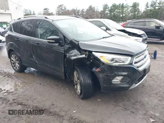 2018 Ford Escape Titanium with VIN 1FMCU9J99JUA14598, listed as a IAAI auction lot 41859368 with 59,438 mi miles and . Bid and sale history available at DreamBid. Image 1.