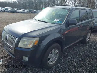 2010 Mercury Mariner z VIN 4M2CN9B73AKJ22994, wystawiony jako IAAI lot #42033710 z przebiegiem Nie podano mil oraz . Historia ofert i sprzedaży dostępna na DreamBid. Obrazek 2.