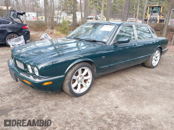 2003 Jaguar XJ with VIN SAJDA15B53MF53212, listed as a IAAI auction lot 41613266 with 180,165 mi miles and . Bid and sale history available at DreamBid. Image 2.