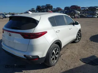 2021 Kia Sportage LX with VIN KNDPM3AC5M7907935, listed as a IAAI auction lot 41738513 with 79,116 mi miles. Bid and sale history available at carsss.com. Image 4.