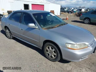 2002 Honda Accord Sdn EX with VIN 1HGCG56642A111957, listed as a IAAI auction lot 41604848 with 165419 miles. Bid and sale history available at carsss.com. Image 1.