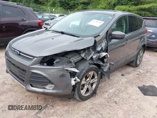 2013 Ford Escape SE with VIN 1FMCU0G96DUC26799, listed as a IAAI auction lot 42751599 with 116,312 mi miles and . Bid and sale history available at DreamBid. Image 2.