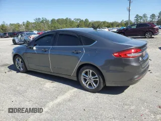 2018 Ford Fusion SE with VIN 3FA6P0HD1JR252599, listed as a Copart auction lot 45666525 with 61,405 mi miles and Salvage Title. Bid and sale history available at DreamBid. Image 2.
