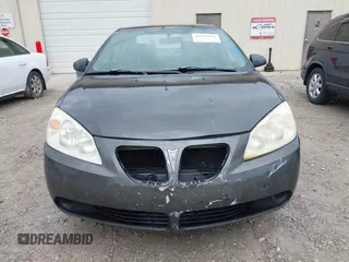 2006 Pontiac G6 1SV z VIN 1G2ZF55B064173939, wystawiony jako IAAI lot #42371852 z przebiegiem 184 690 mil mil oraz . Historia ofert i sprzedaży dostępna na DreamBid. Obrazek 6.