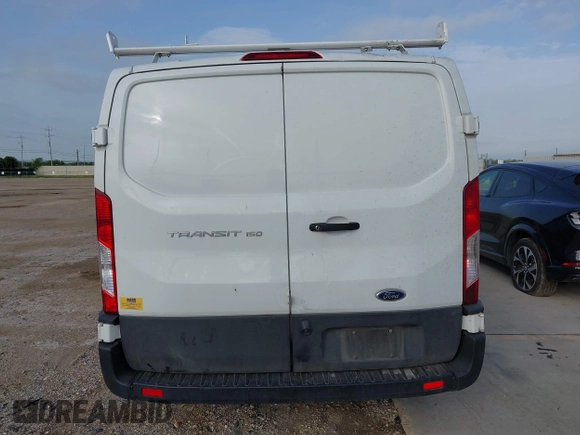 2020 Ford Transit Cargo z VIN 1FTYE1Y82LKB45974, wystawiony jako IAAI lot #42614744 z przebiegiem 200 241 mil mil oraz . Historia ofert i sprzedaży dostępna na DreamBid. Obrazek 16.