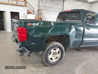 2015 Chevrolet Silverado 1500 LT with VIN 1GCVKREC2FZ147321, listed as a IAAI auction lot 41995003 with 148,053 mi miles and . Bid and sale history available at DreamBid. Image 19.