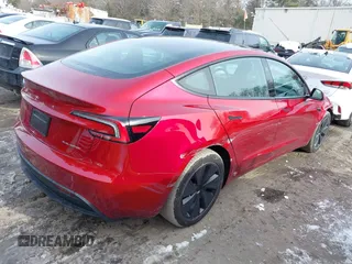 2025 Tesla Model 3 Long Range with VIN 5YJ3E1EB7SF890659, listed as a IAAI auction lot 41550353 with 1,004 mi miles and . Bid and sale history available at DreamBid. Image 4.