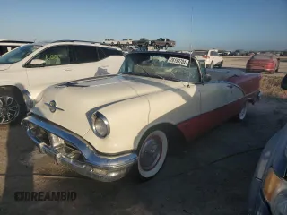1956 Oldsmobile 88 z VIN 568M36274, wystawiony jako Copart lot #76159704 z przebiegiem 10 220 mil mil oraz Nie do naprawy. Historia ofert i sprzedaży dostępna na DreamBid. Obrazek 1.
