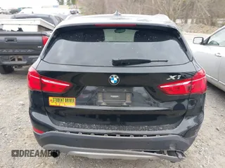 2018 BMW X1 xDrive28i with VIN WBXHT3C34J5K21576, listed as a IAAI auction lot 41822390 with 69,645 mi miles. Bid and sale history available at carsss.com. Image 16.