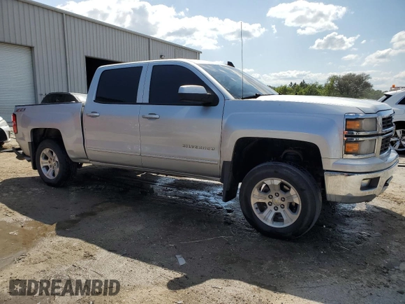 2015 Chevrolet Silverado 1500 LT with VIN 3GCUKREC9FG433906, listed as a Copart auction lot 52495785 with 99,268 mi miles and Salvage Title. Bid and sale history available at DreamBid. Image 4.