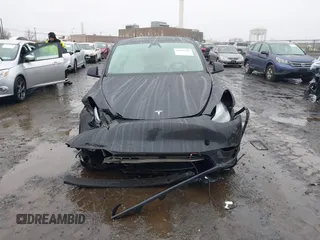2025 Tesla Model Y Long Range with VIN 7SAYGDED6SF226035, listed as a IAAI auction lot 41102115 with Not Provided miles and . Bid and sale history available at DreamBid. Image 12.
