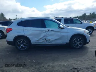 2019 BMW X1 xDrive28i with VIN WBXHT3C56K5L35842, listed as a IAAI auction lot 41981409 with 54,325 mi miles. Bid and sale history available at carsss.com. Image 13.