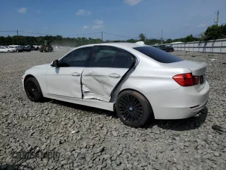 2015 BMW 3 Series 328i xDrive with VIN WBA3B3G52FNT19323, listed as a Copart auction lot 61873015 with 110,893 mi miles and Salvage title. Bid and sale history available at DreamBid. Image 2.