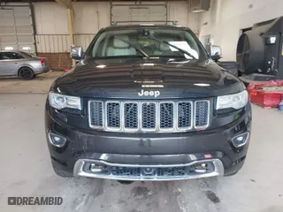 2014 Jeep Grand Cherokee Overland with VIN 1C4RJFCM4EC386398, listed as a IAAI auction lot 41696113 with 119,110 mi miles. Bid and sale history available at carsss.com. Image 6.