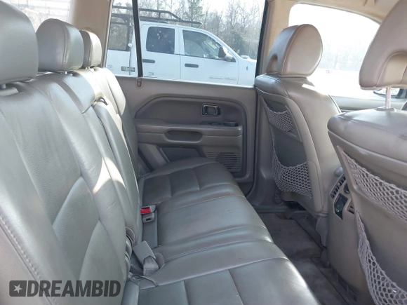 2006 Honda Pilot EX-L with VIN 5FNYF18766B026721, listed as a IAAI auction lot 41690993 with 219,473 mi miles and . Bid and sale history available at DreamBid. Image 8.