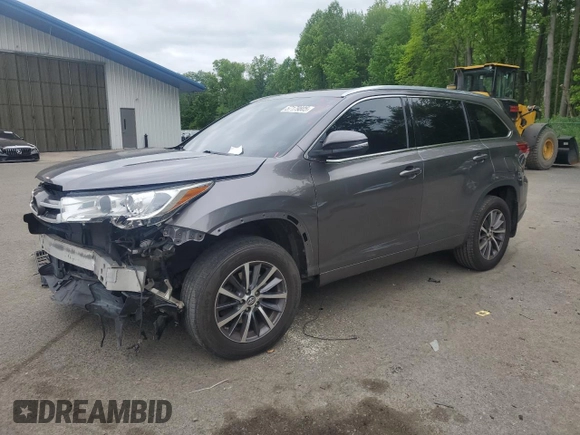 2018 Toyota Highlander SE with VIN 5TDJZRFH1JS816807, listed as a Copart auction lot 57179805 with 92,327 mi miles and Salvage title. Bid and sale history available at DreamBid. Image 1.