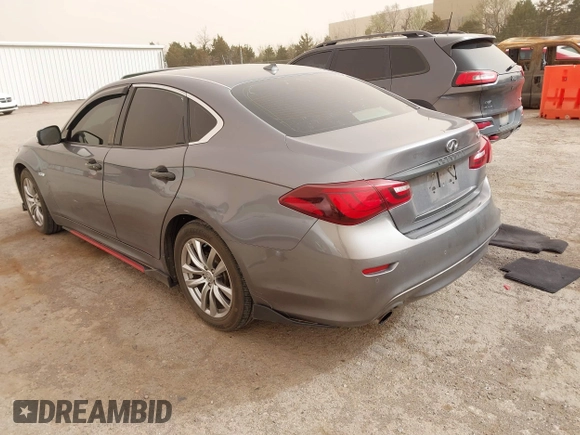 2015 Infiniti M35h Hybrid with VIN JN1EY1AP2FM510029, listed as a IAAI auction lot 41795913 with 152,475 mi miles. Bid and sale history available at carsss.com. Image 3.