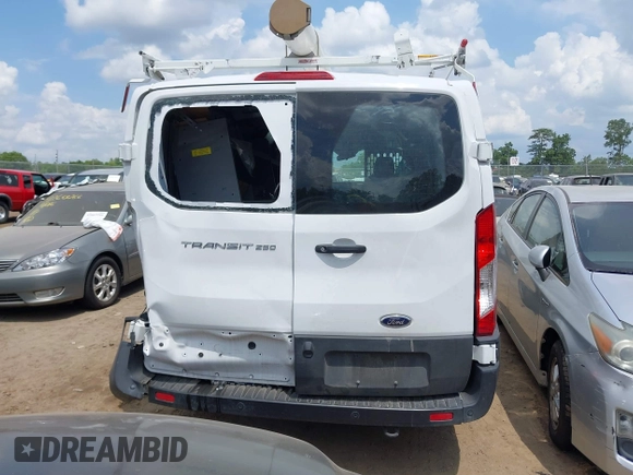 2024 Ford Transit Cargo with VIN 1FTBR1Y89RKA01132, listed as a IAAI auction lot 42668811 with 31,666 mi miles and . Bid and sale history available at DreamBid. Image 16.