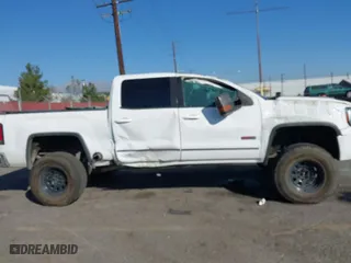 2016 GMC Sierra 1500 SLT with VIN 3GTU2NEC2GG244329, listed as a IAAI auction lot 40810002 with 121,716 mi miles. Bid and sale history available at carsss.com. Image 13.