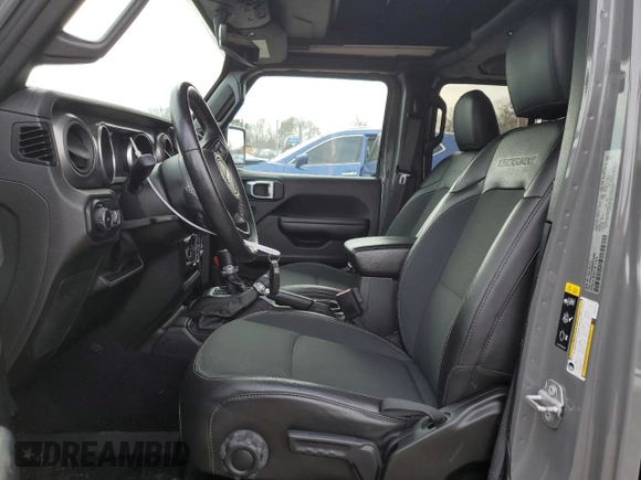 2021 Jeep Wrangler Unlimited Freedom with VIN 1C4HJXDN4MW672340, listed as a Copart auction lot 49406695 with 48,832 mi miles and Salvage title. Bid and sale history available at DreamBid. Image 7.