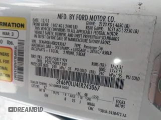2014 Ford Fusion SE Hybrid with VIN 3FA6P0LU4ER243067, listed as a IAAI auction lot 41378720 with 129,625 mi miles. Bid and sale history available at carsss.com. Image 9.