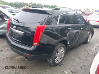 2011 Cadillac SRX Luxury Collection z VIN 3GYFNAEY0BS629344, wystawiony jako IAAI lot #42208369 z przebiegiem 198 330 mil mil oraz . Historia ofert i sprzedaży dostępna na DreamBid. Obrazek 4.