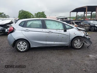 2017 Honda Fit LX with VIN 3HGGK5G53HM700502, listed as a IAAI auction lot 40777067 with 95,827 mi miles and . Bid and sale history available at DreamBid. Image 14.