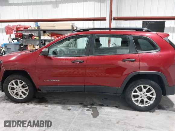 2015 Jeep Cherokee Sport with VIN 1C4PJMAB8FW719652, listed as a IAAI auction lot 41475308 with 247,960 mi miles. Bid and sale history available at carsss.com. Image 14.
