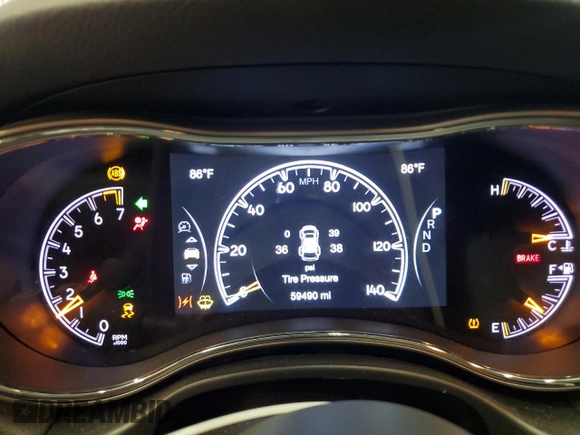 2021 Jeep Grand Cherokee Limited z VIN 1C4RJFBG1MC562401, wystawiony jako Copart lot #59463725 z przebiegiem 59 490 mil mil oraz Szkoda całkowita • Salvage title. Historia ofert i sprzedaży dostępna na DreamBid. Obrazek 9.