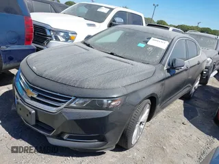 2014 Chevrolet Impala LT with VIN 1G1125S30EU118979, listed as a IAAI auction lot 40084364 with 145,015 mi miles and . Bid and sale history available at DreamBid. Image 2.