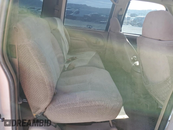 1998 GMC Suburban z VIN 1GKEC16R0WJ712847, wystawiony jako Copart lot #68557804 z przebiegiem 262 538 mil mil oraz Szkoda całkowita • Salvage title. Historia ofert i sprzedaży dostępna na DreamBid. Obrazek 12.