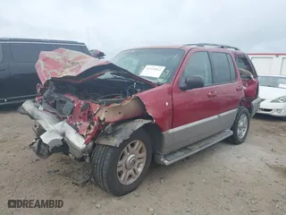 2003 Mercury Mountaineer Convenience with VIN 4M2ZU66K23ZJ38608, listed as a IAAI auction lot 41935862 with 128,173 mi miles. Bid and sale history available at carsss.com. Image 2.
