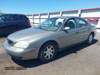 2002 Mercury Sable GS z VIN 1MEFM50U92G639145, wystawiony jako IAAI lot #42373493 z przebiegiem 193 318 mil mil oraz . Historia ofert i sprzedaży dostępna na DreamBid. Obrazek 2.