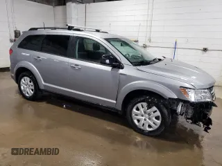 2018 Dodge Journey SE with VIN 3C4PDCAB0JT527478, listed as a Copart auction lot 51521555 with 102,857 mi miles and Salvage Title. Bid and sale history available at carsss.com. Image 4.