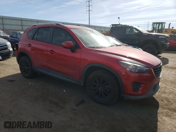 2016 Mazda CX-5 Grand Touring with VIN JM3KE4DYXG0850270, listed as a Copart auction lot 83681274 with 121,486 mi miles and Salvage Title. Bid and sale history available at carsss.com. Image 4.
